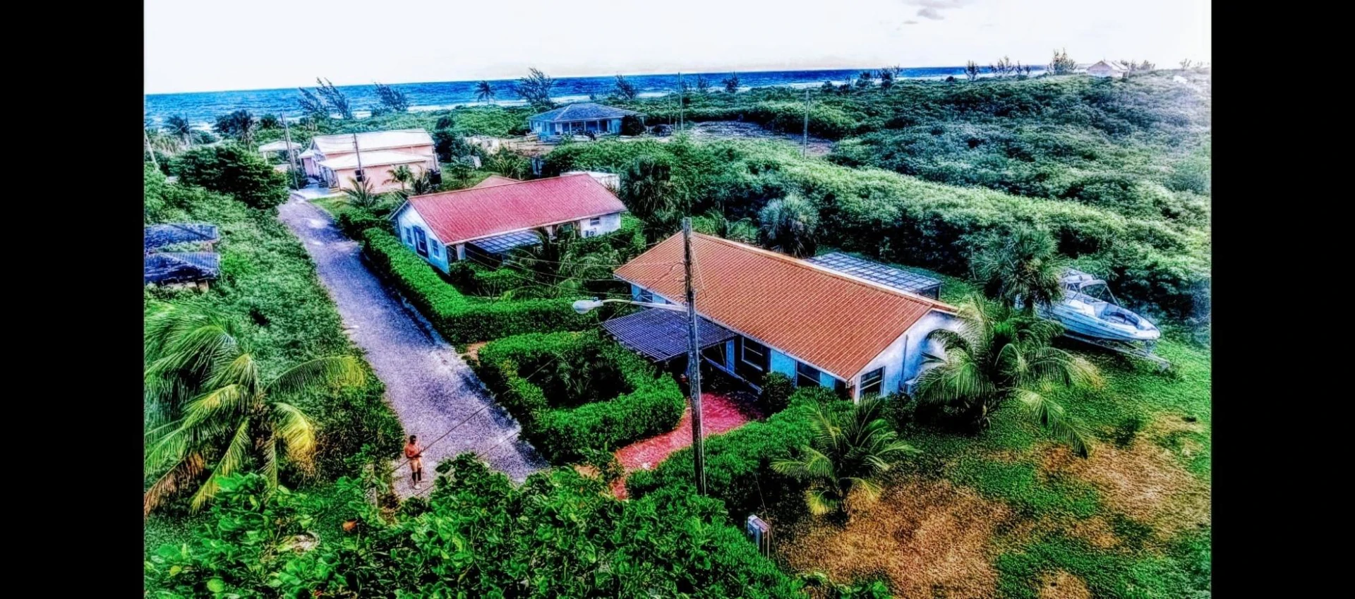 TWO INCOME GENERATING HOMES ON ONE LOT!