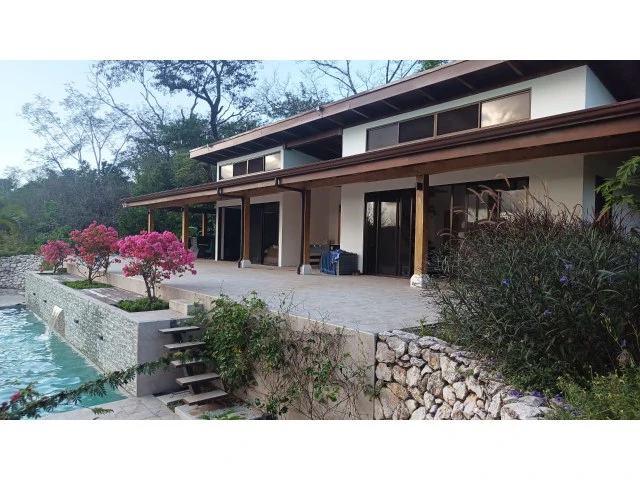Stunning Dream Home and Pool with Separate cute smart Apartment building for Sale Surrounded by lush nature in the soft rolling hills of Hojancha