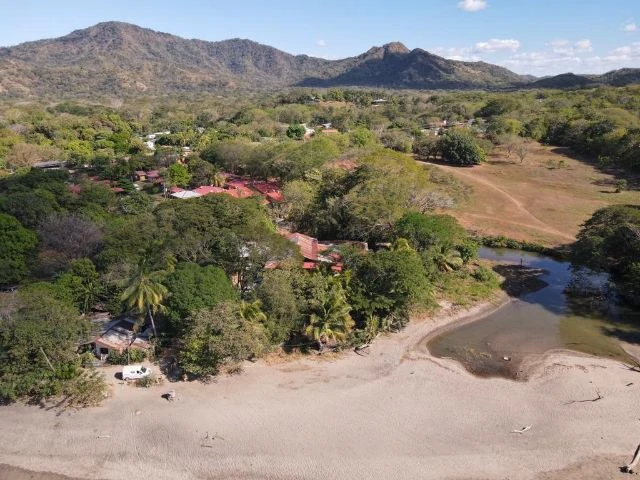 Private titled  Beachfront Property for sale in best prime position,  previously used as a 20-room hotel and camping side, directly in front of the most beautiful Conchal Beach