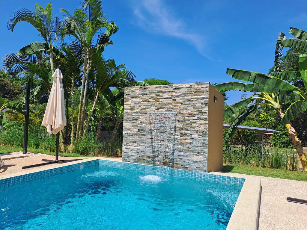 Compound Cooper: Compound Cooper includes Casa Cooper - a Newly constructed in 2023 - 2 Bedroom 1 Bath home set on a spacious 703 m2 lot and Lote Cooper which is 2485 m2 of flat buildable land - both - Gallery image 11