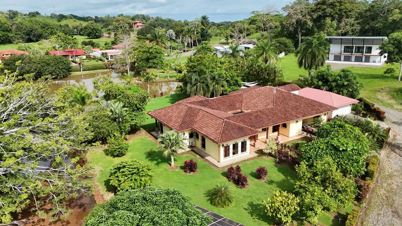 Tropical Luxury Estate with Private Lake, Pool & Prime Location Near Costa Rica’s Best Beaches: Near the Coast House For Sale in Parrita - Gallery image 3