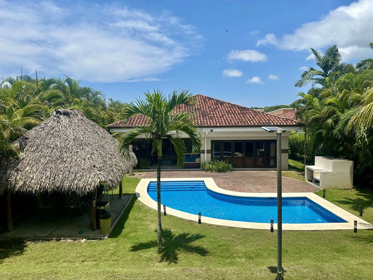 Villa 447: $649,000 USD Luxury NICOYA BAY HOME for sale on the Golf Course!  Privacy, Tropical gardens, Fully Furnished, Beautiful views, Strong concrete block construction, High ceilings.......