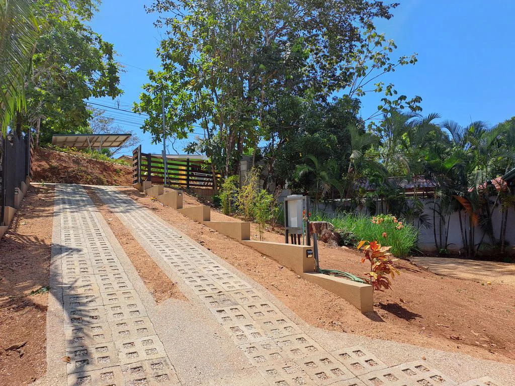 Compound Cooper: Compound Cooper includes Casa Cooper - a Newly constructed in 2023 - 2 Bedroom 1 Bath home set on a spacious 703 m2 lot and Lote Cooper which is 2485 m2 of flat buildable land - both - Gallery image 18