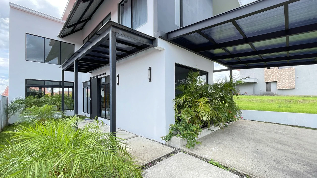 Modern Two-Story Home in Gated Community in Grecia– 5 Minutes from Downtown - photo 2