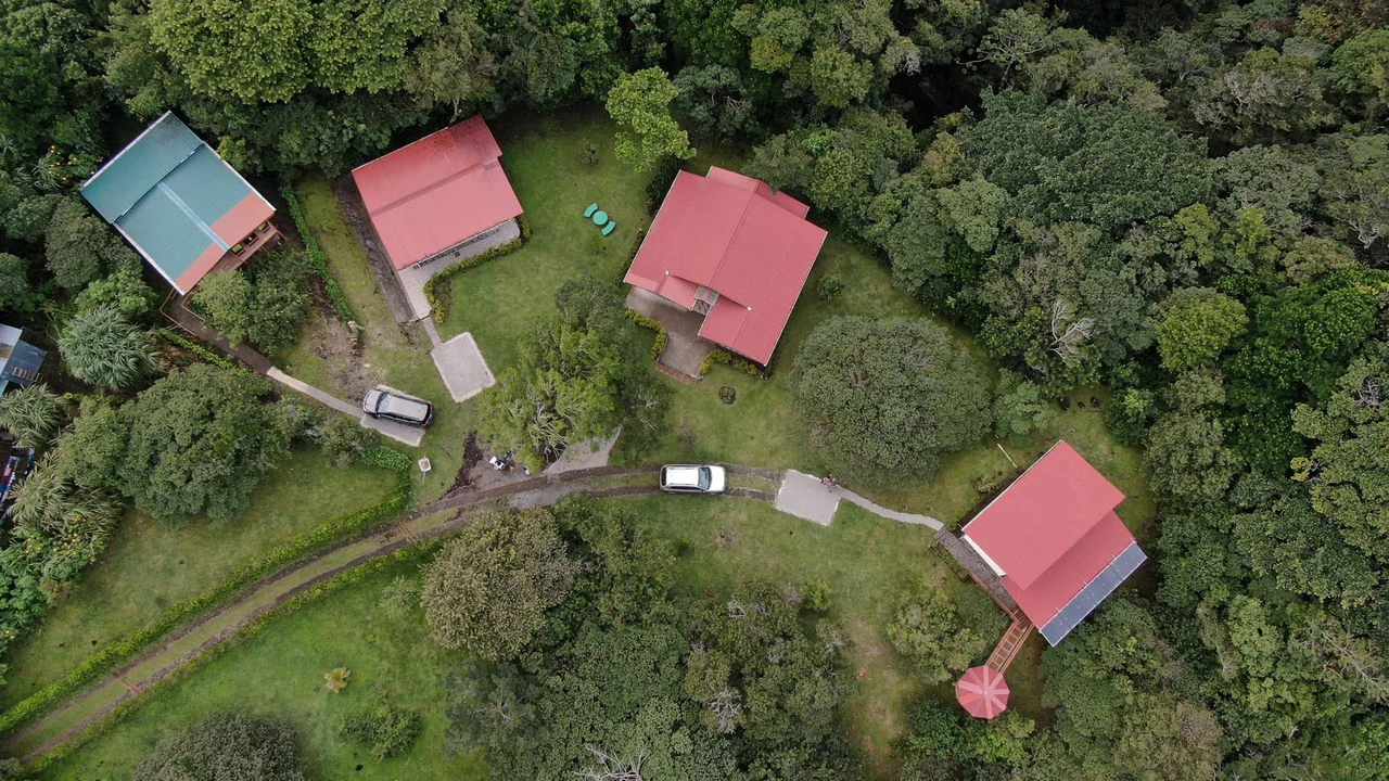 2 Acres with 4 houses Centrally located in Monteverde BV0224: Turn-Key Accommodations Business on 2 Acres Just 5 Minutes from Santa Elena – Surrounded by Nature, Ready to Grow