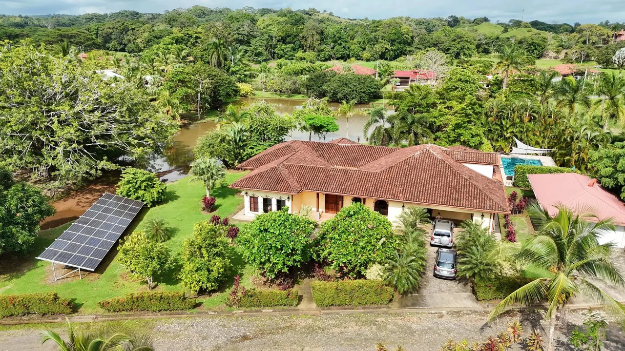 Tropical Luxury Estate with Private Lake, Pool & Prime Location Near Costa Rica’s Best Beaches: Near the Coast House For Sale in Parrita - Gallery image 4