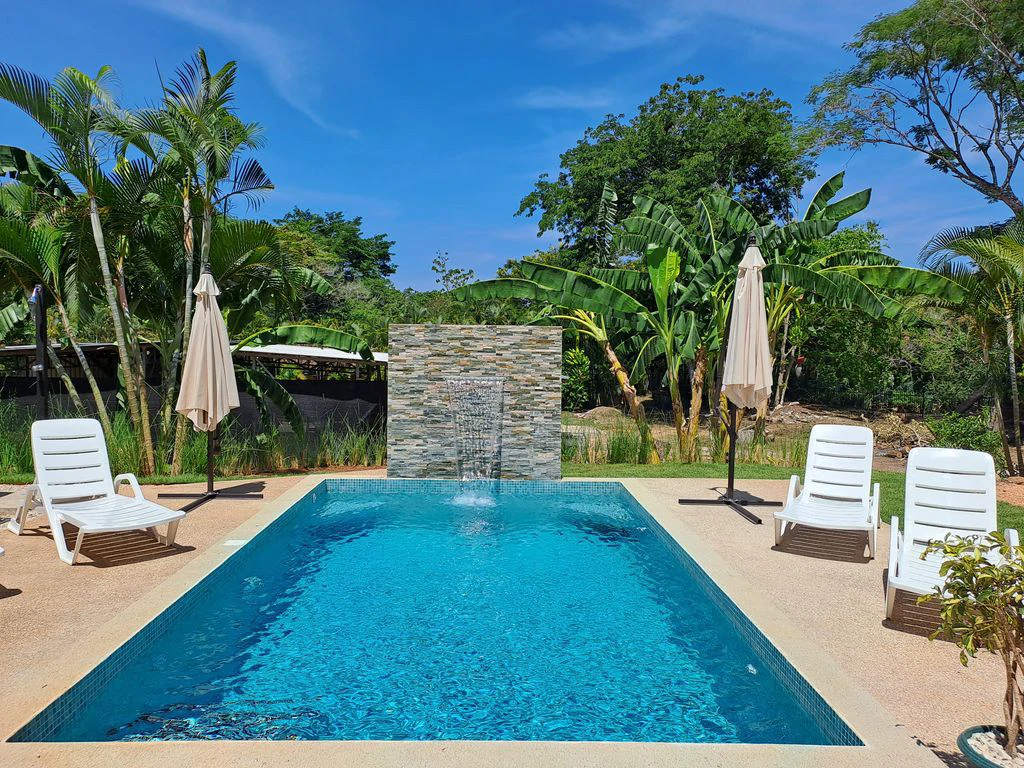 Compound Cooper: Compound Cooper includes Casa Cooper - a Newly constructed in 2023 - 2 Bedroom 1 Bath home set on a spacious 703 m2 lot and Lote Cooper which is 2485 m2 of flat buildable land - both - Gallery image 9