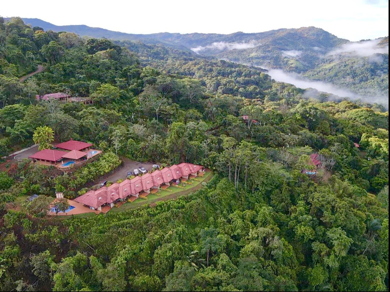 2.8 ACRES – 10 Income Producing Condos with a Pool and Spectacular Ocean and Mountain Views! Gated Community of Cascada Azul, 15min to Dominical Beach!!!: Near the Coast, Mountain and Countryside Apar