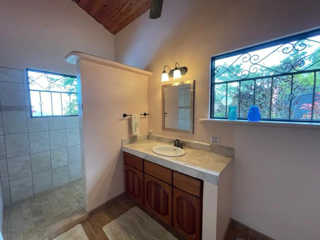 5.2 ACRES – 2 Bedroom Home With 60 Ft Infinity Lap Pool, 1 Bedroom Guest House, Fabulous Ocean View, Mature Fruit Trees!!! - Gallery image 22