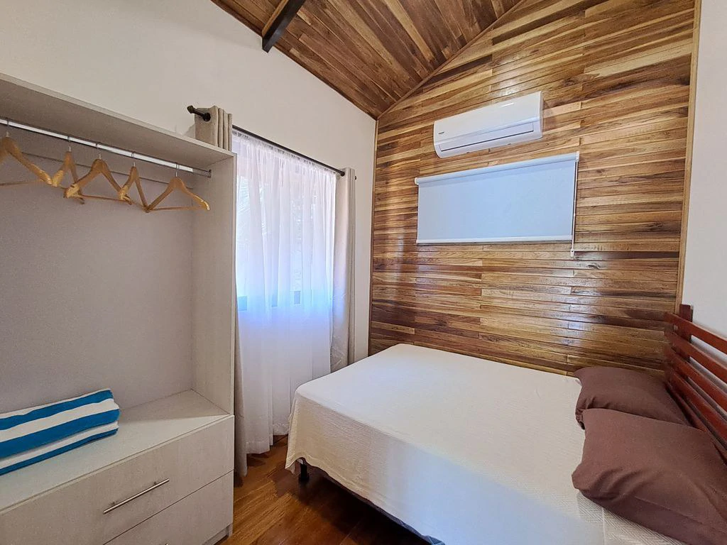 Compound Cooper: Compound Cooper includes Casa Cooper - a Newly constructed in 2023 - 2 Bedroom 1 Bath home set on a spacious 703 m2 lot and Lote Cooper which is 2485 m2 of flat buildable land - both - Gallery image 20