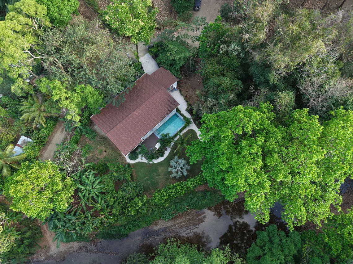 Casa Del Rio: Under Contract | Elegant Contemporary Tropical Home with Pool and Peaceful River Setting, Minutes from Sámara