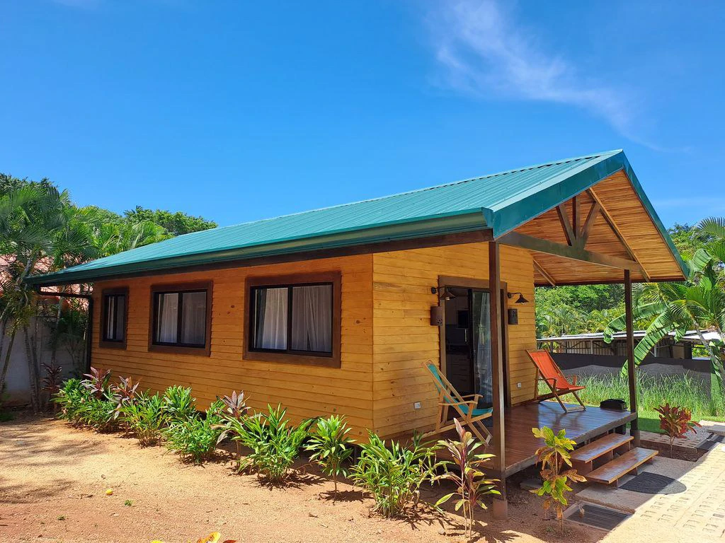 Compound Cooper: Compound Cooper includes Casa Cooper - a Newly constructed in 2023 - 2 Bedroom 1 Bath home set on a spacious 703 m2 lot and Lote Cooper which is 2485 m2 of flat buildable land - both - Gallery image 7