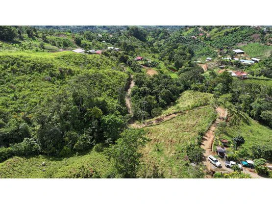 Panoramic View Lot with Tranquil Creek and Easy Access to San Isidro