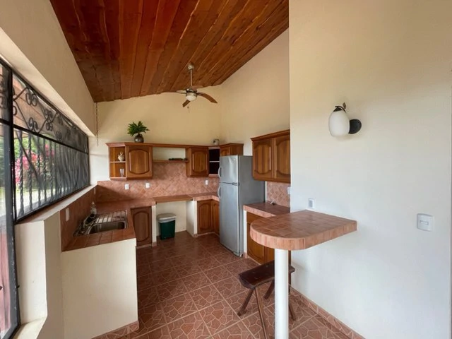 5.2 ACRES – 2 Bedroom Home With 60 Ft Infinity Lap Pool, 1 Bedroom Guest House, Fabulous Ocean View, Mature Fruit Trees!!! - Gallery image 29