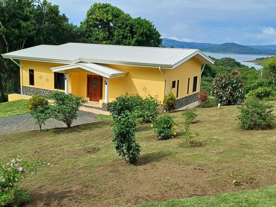 VILLA DEL SOL: Reduced ! Lake Arenal view home in upscale neighborhood
