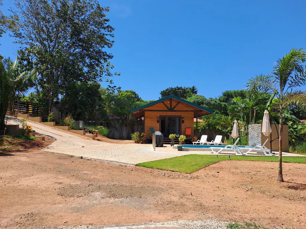 Compound Cooper: Compound Cooper includes Casa Cooper - a Newly constructed in 2023 - 2 Bedroom 1 Bath home set on a spacious 703 m2 lot and Lote Cooper which is 2485 m2 of flat buildable land - both - Gallery image 6