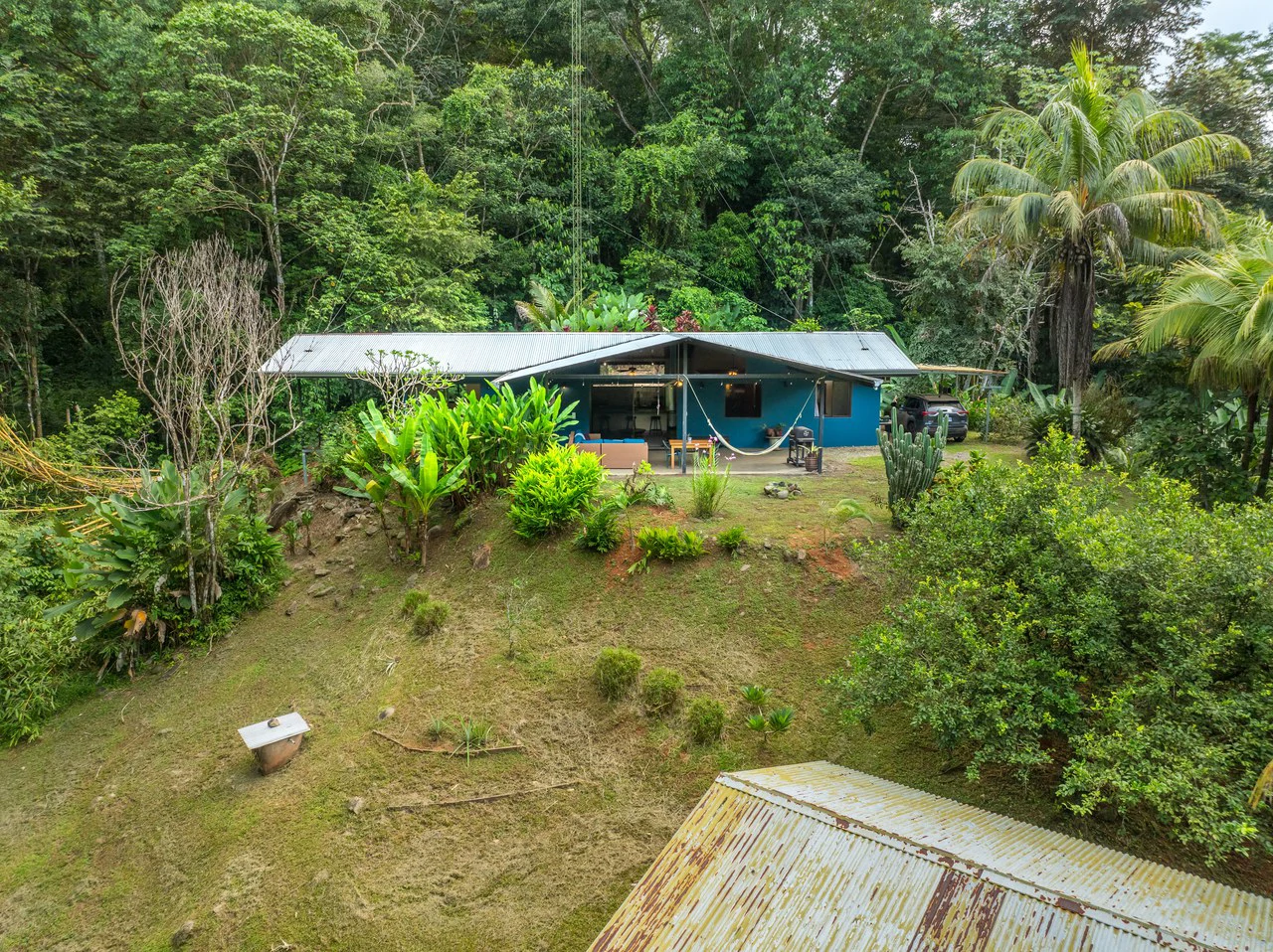 Tropical Hideaway – 7 Acres of Secluded Riverfront with a 3-Bedroom Home: Mountain House For Sale in Bahía Ballena - Gallery image 2