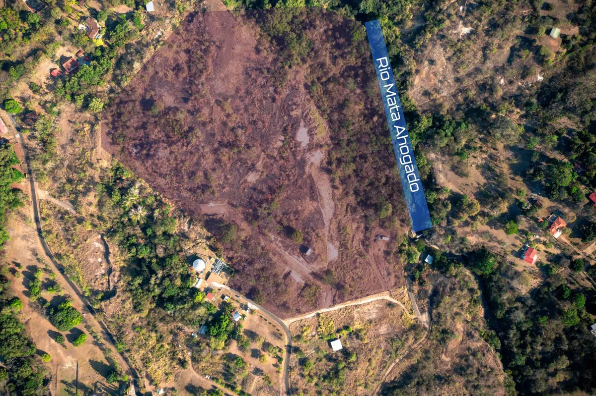 Sale of 8-Hectare Farm in San Carlos with River Frontage